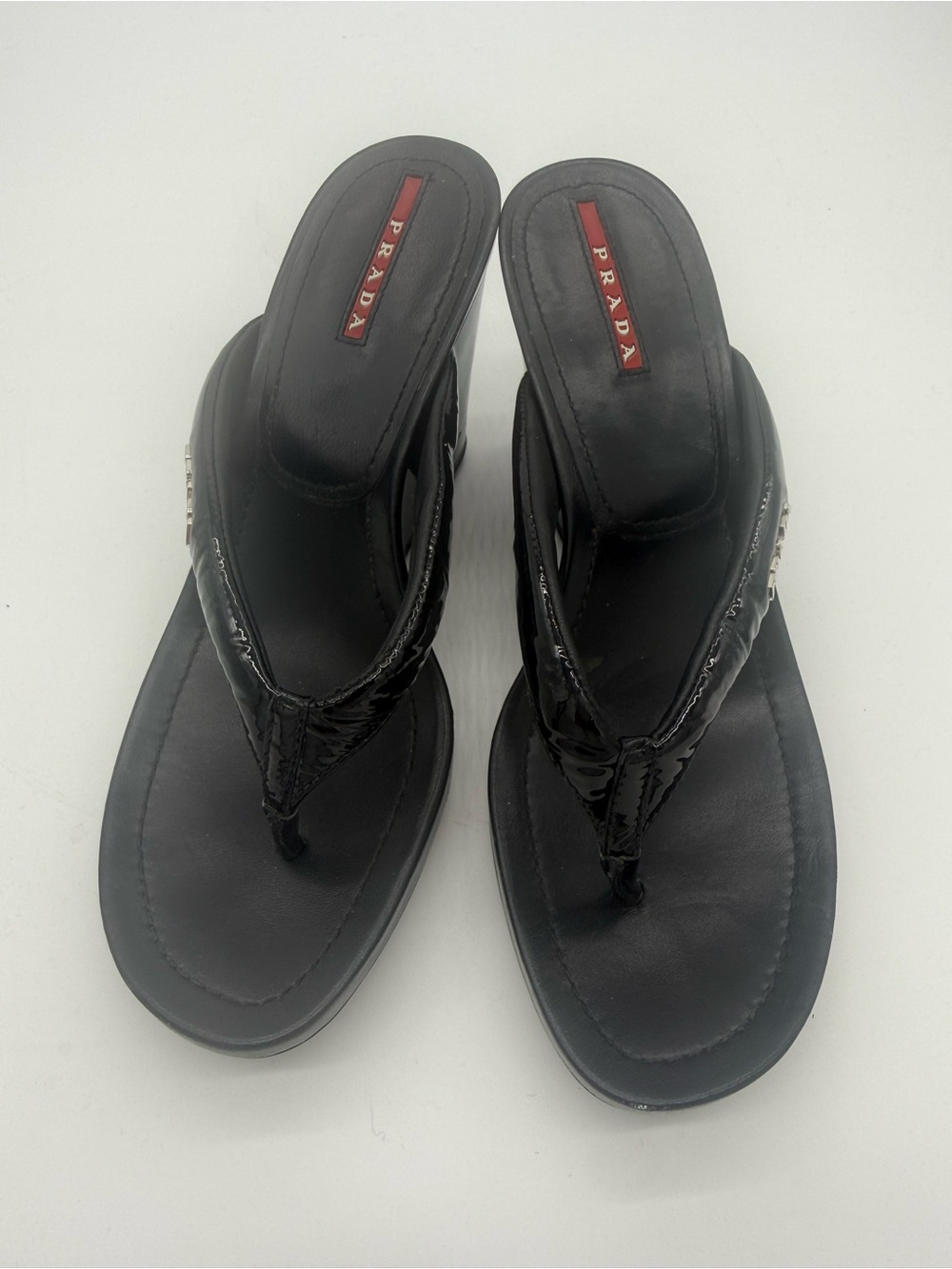 Prada Black Patent Thong Wedge Sandals with Red Logo Inlay